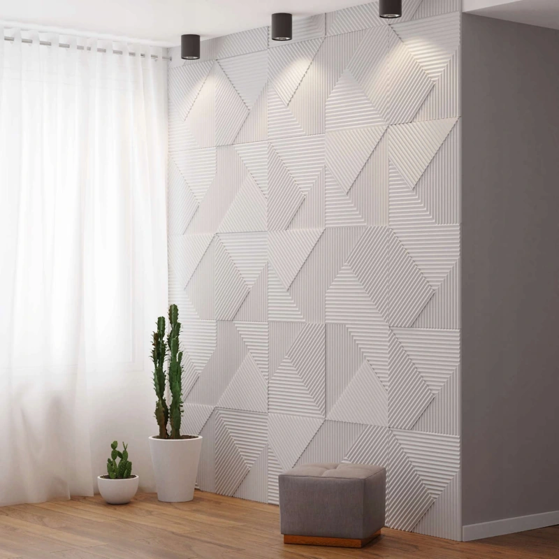 Geometric white 3D triangle textured accent wall