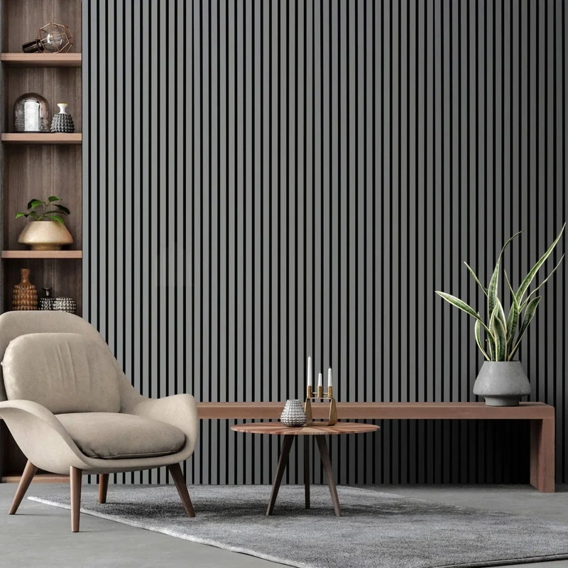Minimalist charcoal vertical slat wall with armchair