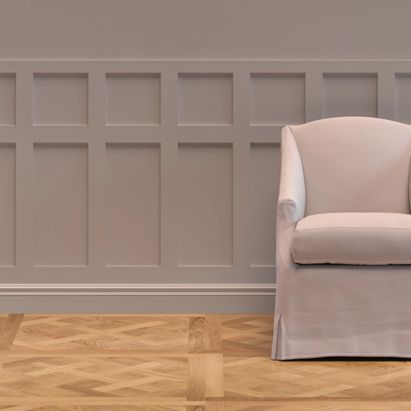Taupe shaker-style wall paneling behind a chair.