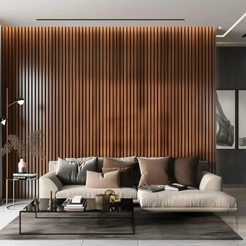 Vertical walnut wood slat wall behind a cream sofa